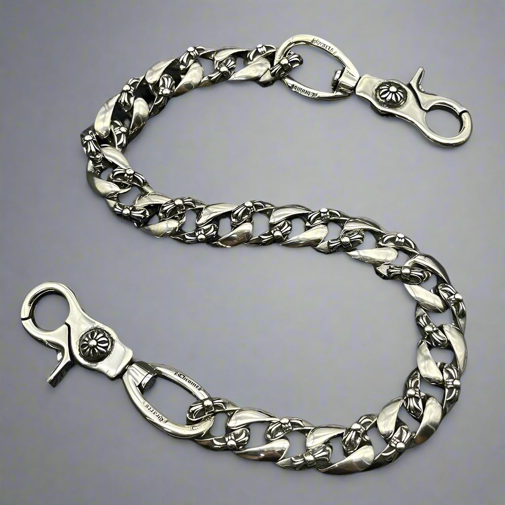 Silver chain with clasp on a black background